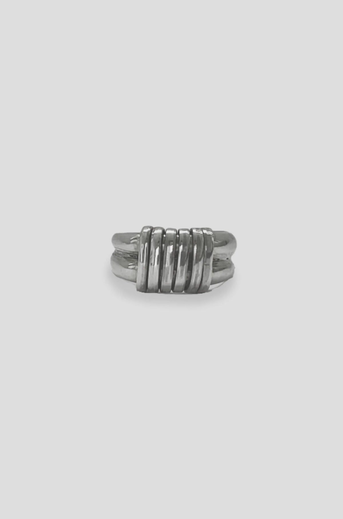 CROSSED RING